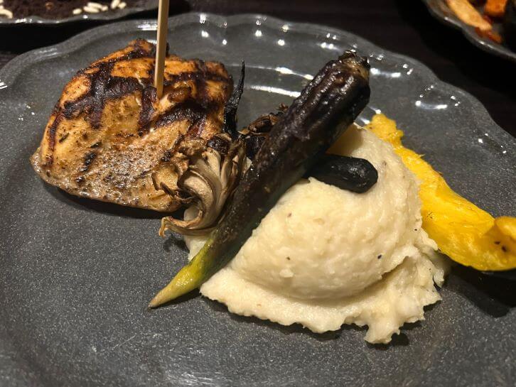 salmon on a stake at das stakehaus